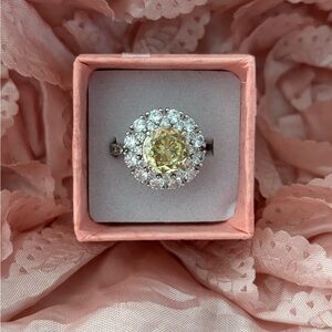 Elegant Yellow and Silver Halo Ring